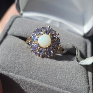 New. 10k Australian opal & tanzanite ring size 7. Stamped 10k. New with tags. Op